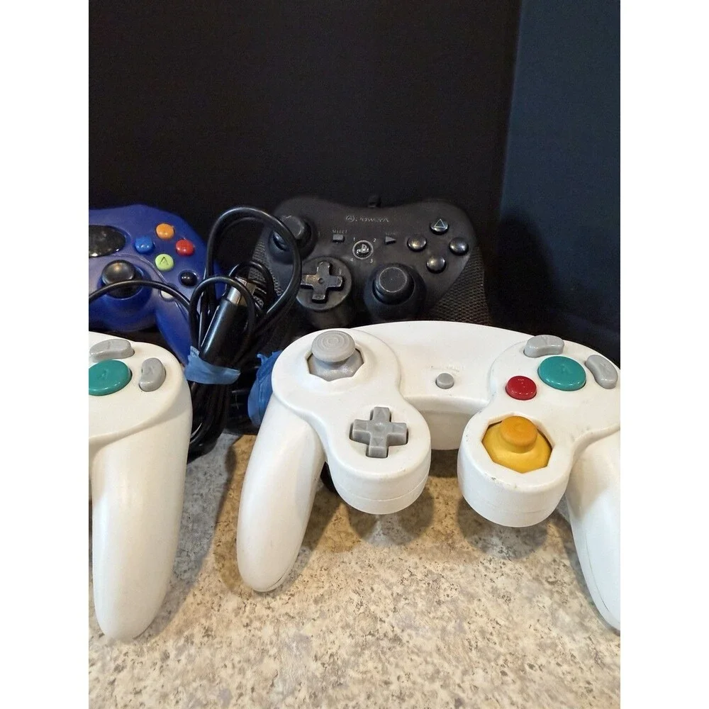 Lot of 7 Mixed Video Game Controllers GameCube Xbox PS Untested Pelican GameStop